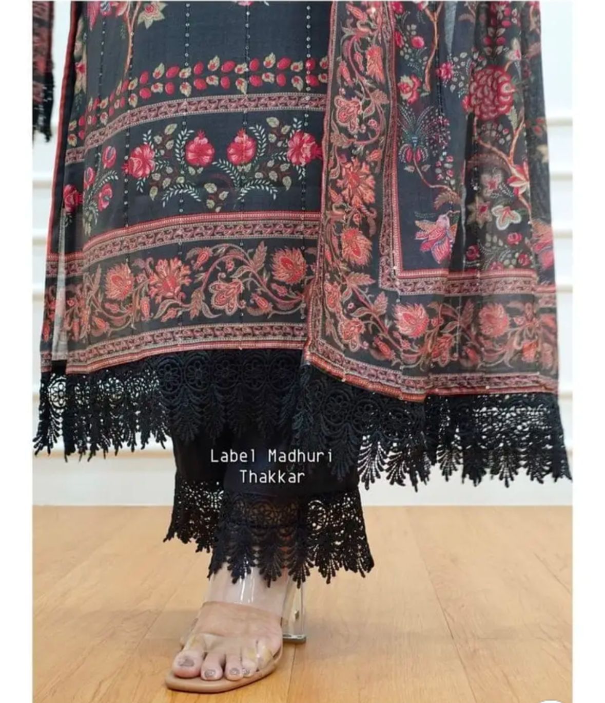Women black art silk pakistani suit, sequin embroidery and lace detailing all over