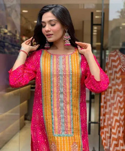 Mirror work heavy designer suit with designer dupatta